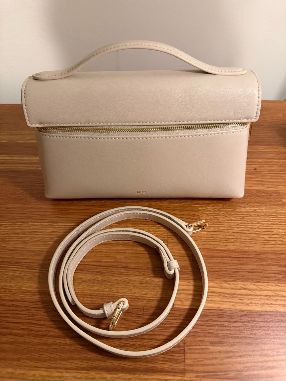 JW PEI Cream Wristlet Clutch with Gold Zip